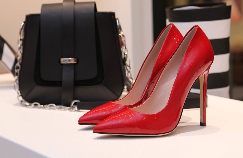 Red stiletto heels and handbag — women's shoes